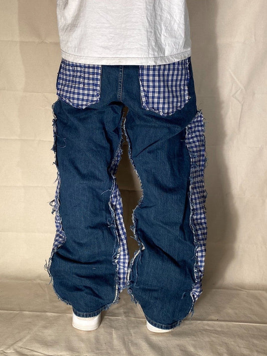 Reworked distressed plaid denim