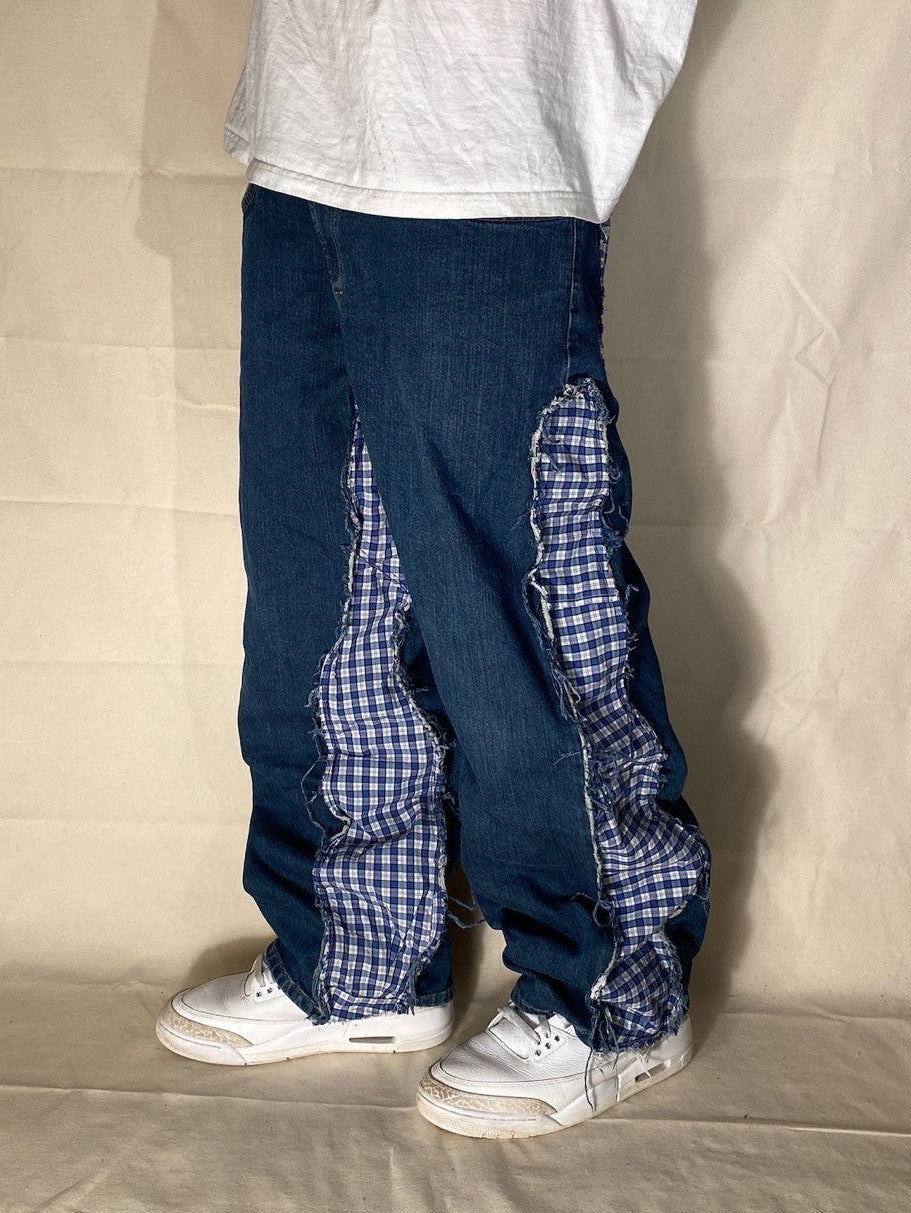 Reworked distressed plaid denim