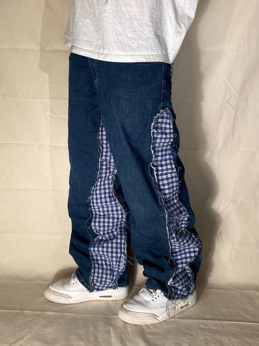 Reworked distressed plaid denim